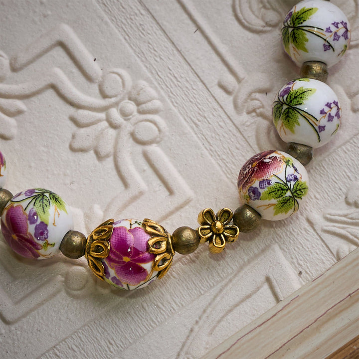 SolaceBeads Floral Ceramic Rosary Bracelet: A Bloom of Grace in Every Bead