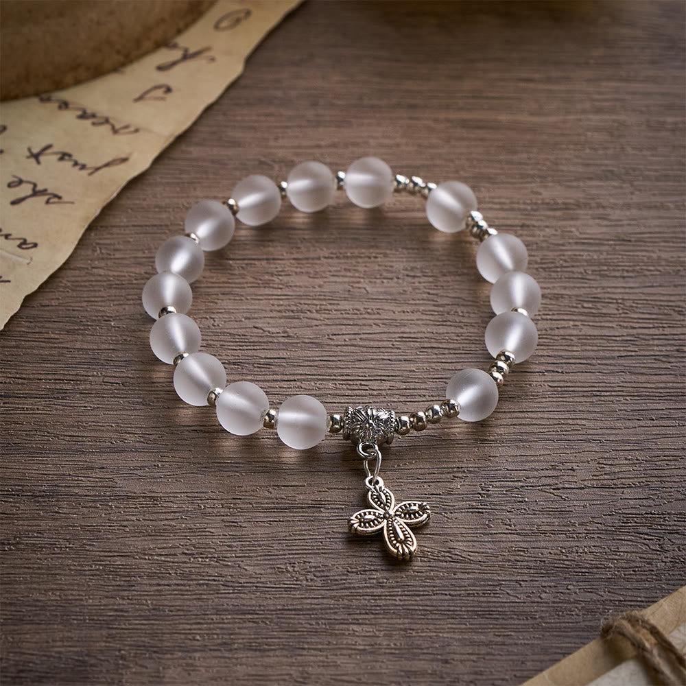 Solacebeads Frosted White Bead Bracelet: Sacred Clarity With Ornate Spacer & Cross