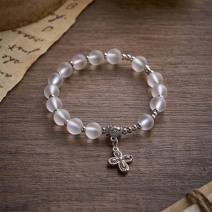 Solacebeads Frosted White Bead Bracelet: Sacred Clarity With Ornate Spacer &amp; Cross