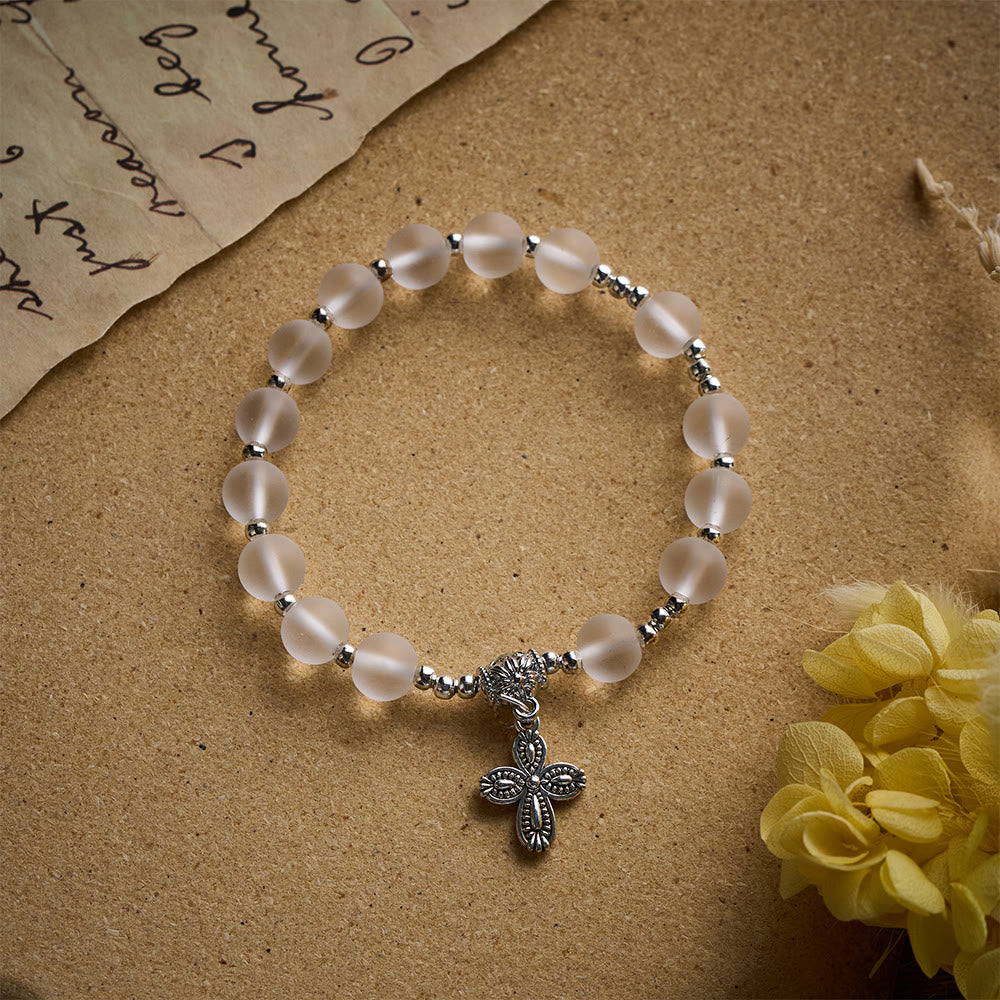 Solacebeads Frosted White Bead Bracelet: Sacred Clarity With Ornate Spacer &amp; Cross