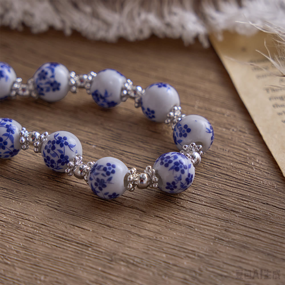 SolaceBeads Floral Ceramic Bracelet With Rhinestone Accents &amp; Benedict Medal: Timeless Devotion